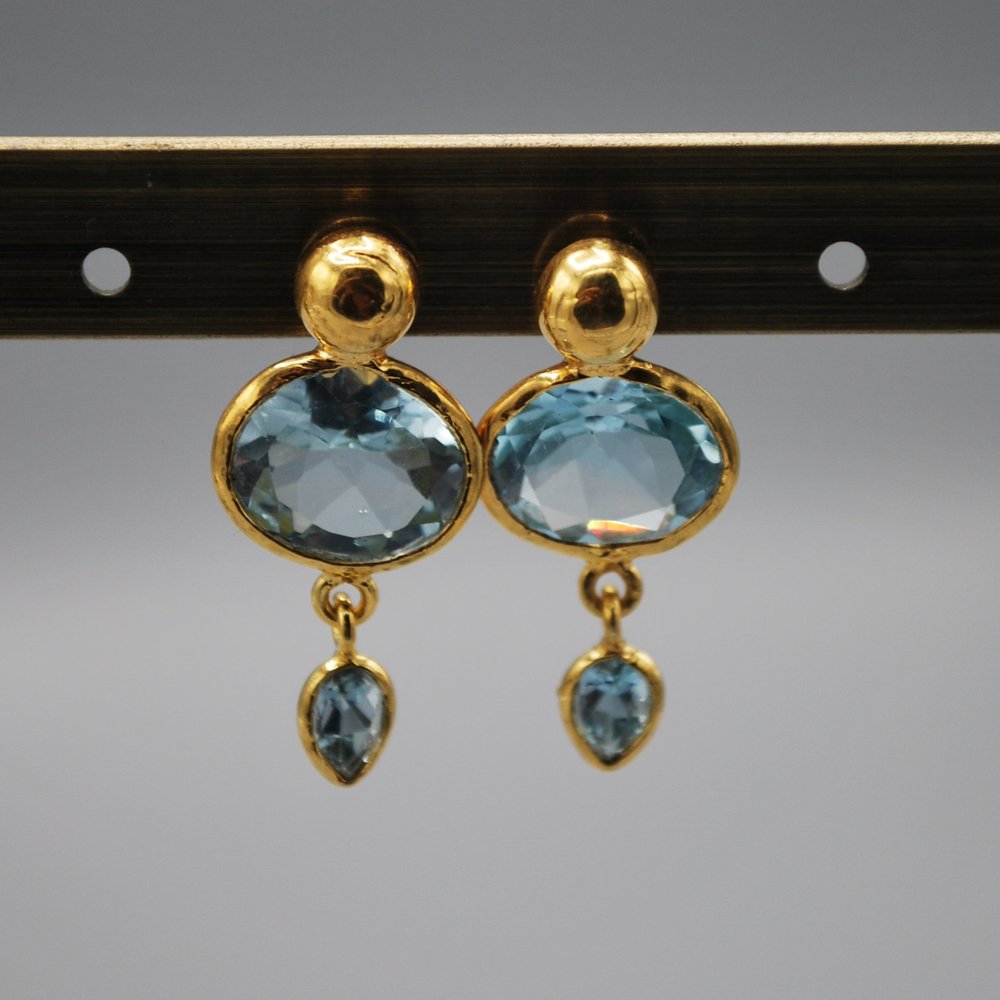 Gold stud, oval gem tiny teardrop - blue topaz