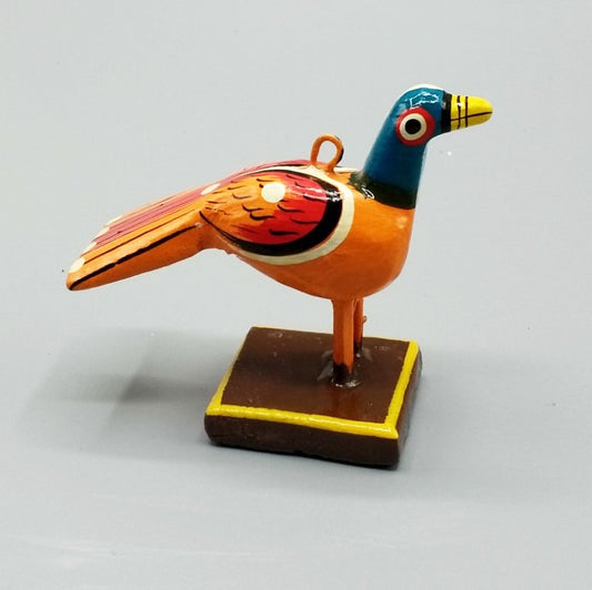 Little orange wooden bird