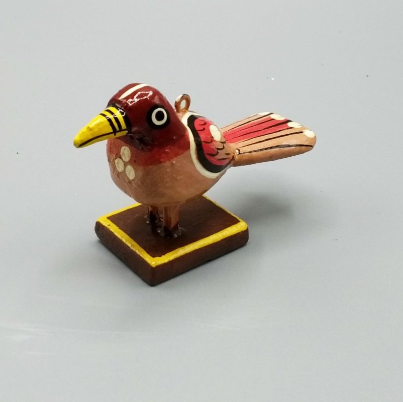 Little red wooden bird