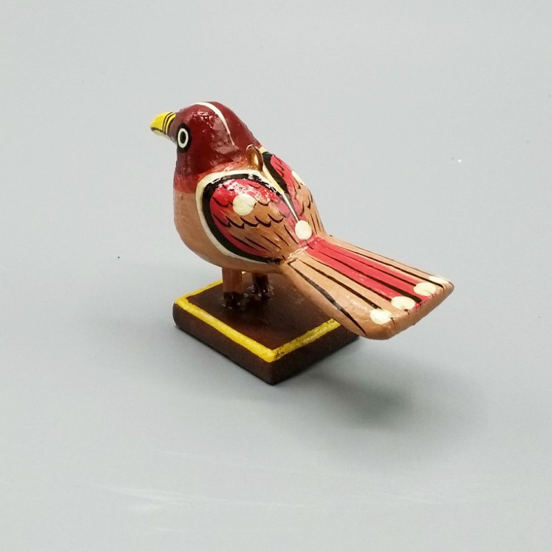 Little red wooden bird