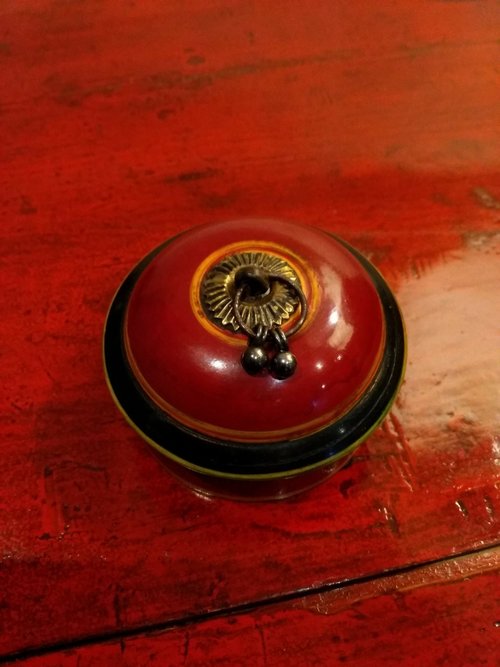 Small round hand crafted spice box