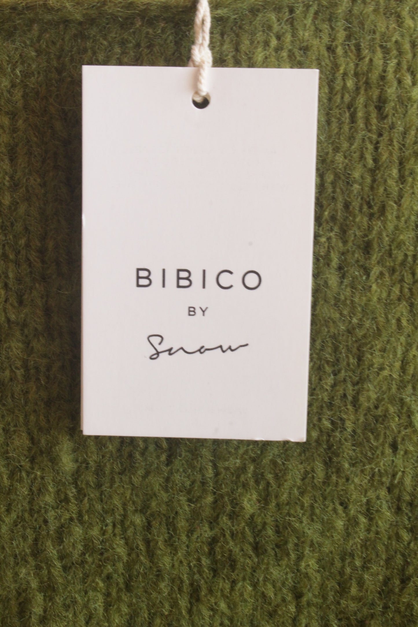 Pure wool hand knitted apple green ovesized V-neck jumper