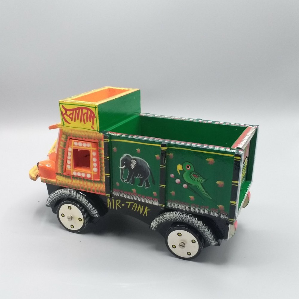 Orange/green wooden truck