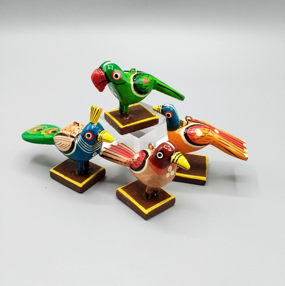 Little orange wooden bird