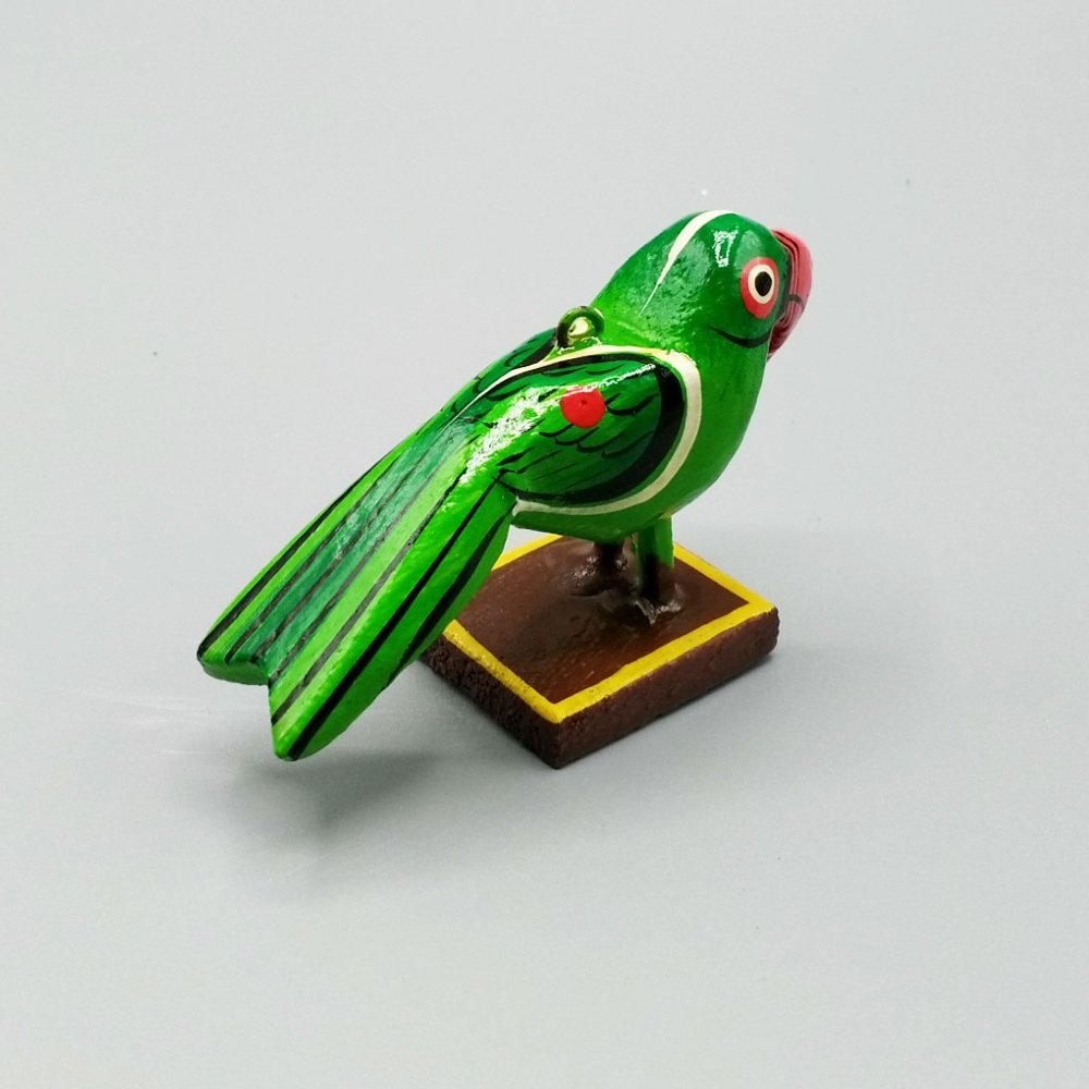 Little green wooden bird