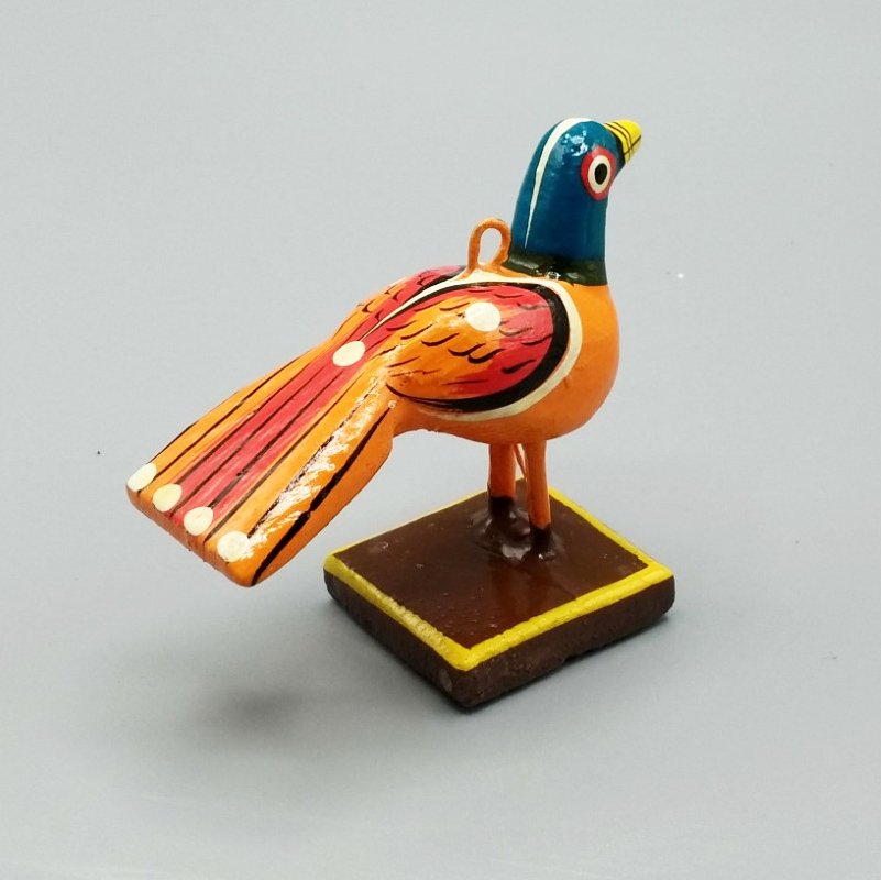 Little orange wooden bird