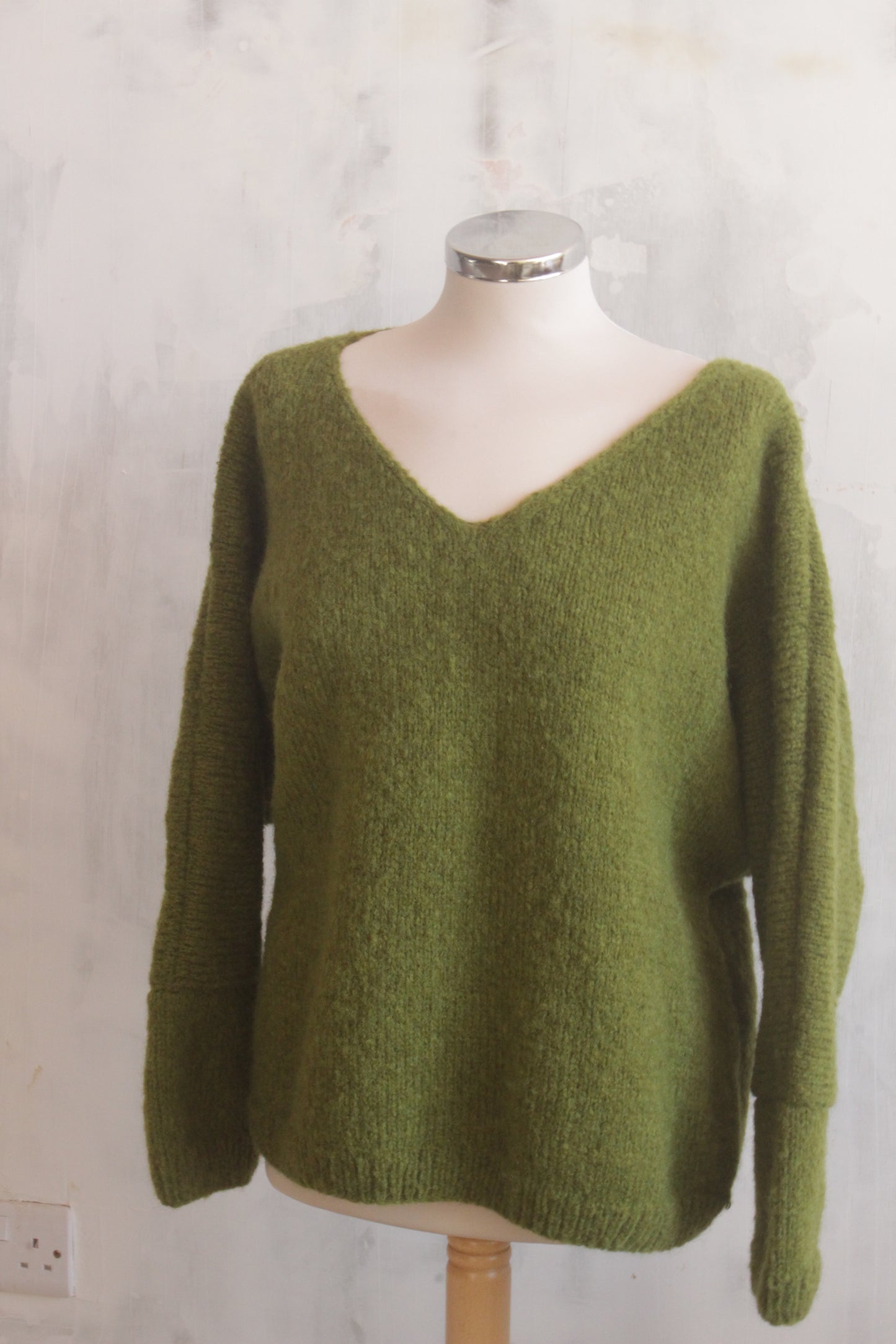 Pure wool hand knitted apple green ovesized V-neck jumper